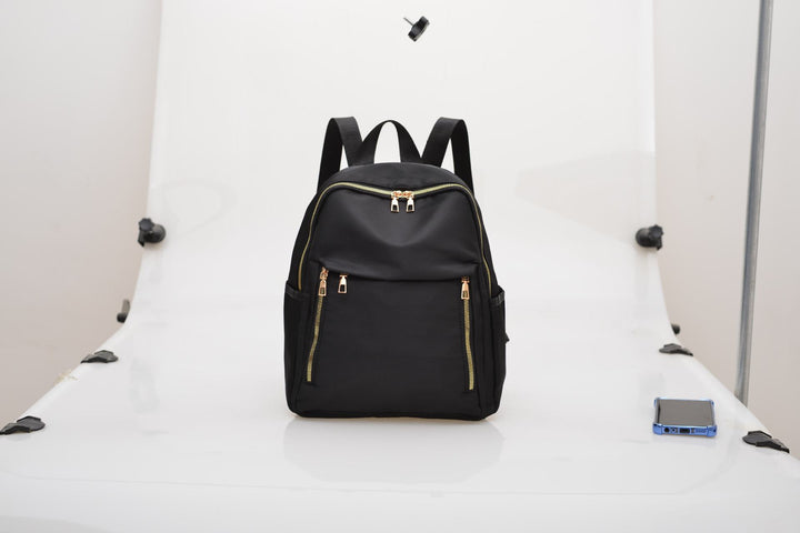 Damen eleganter City-Rucksack mit doppeltem Reißverschluss und praktischen Seitentaschen Nord Taschen