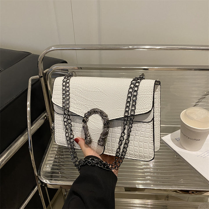 Damen elegante Handtasche mit stilvollem Schlangenverschluss Nord Taschen