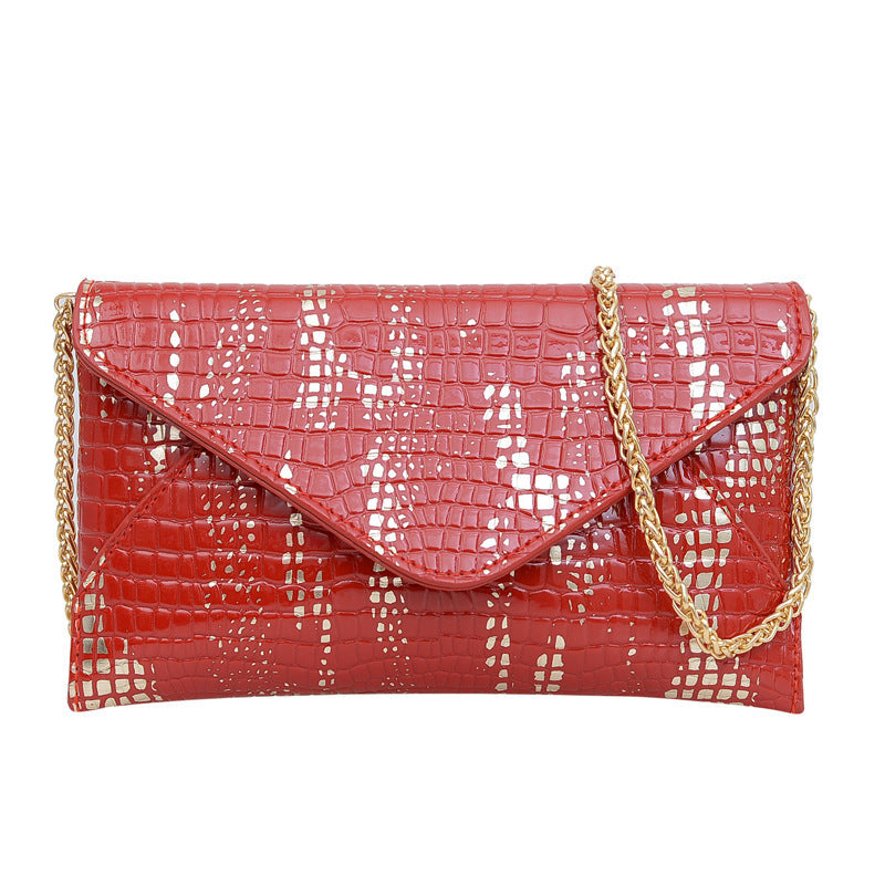 Damen Glamouröse Clutch-Tasche mit Kroko-Prägung und goldenen Akzenten Nord Taschen
