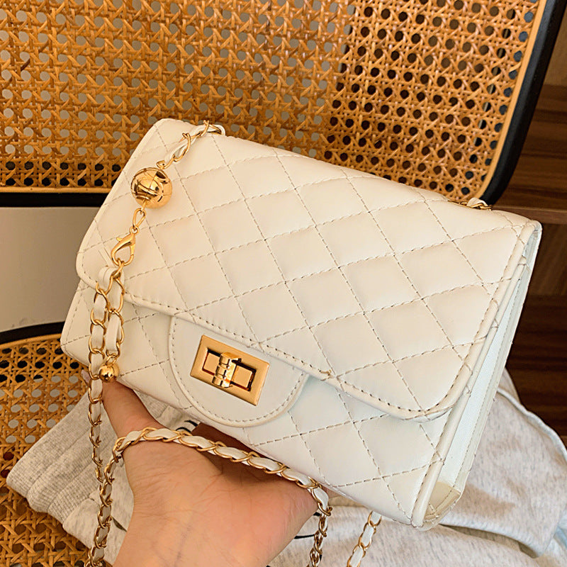 Damen Umhängetasche mit gefüttertem Quiltmuster und Goldakzenten Nord Taschen
