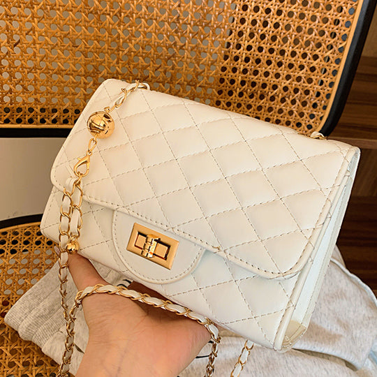 Damen Umhängetasche mit gefüttertem Quiltmuster und Goldakzenten Nord Taschen