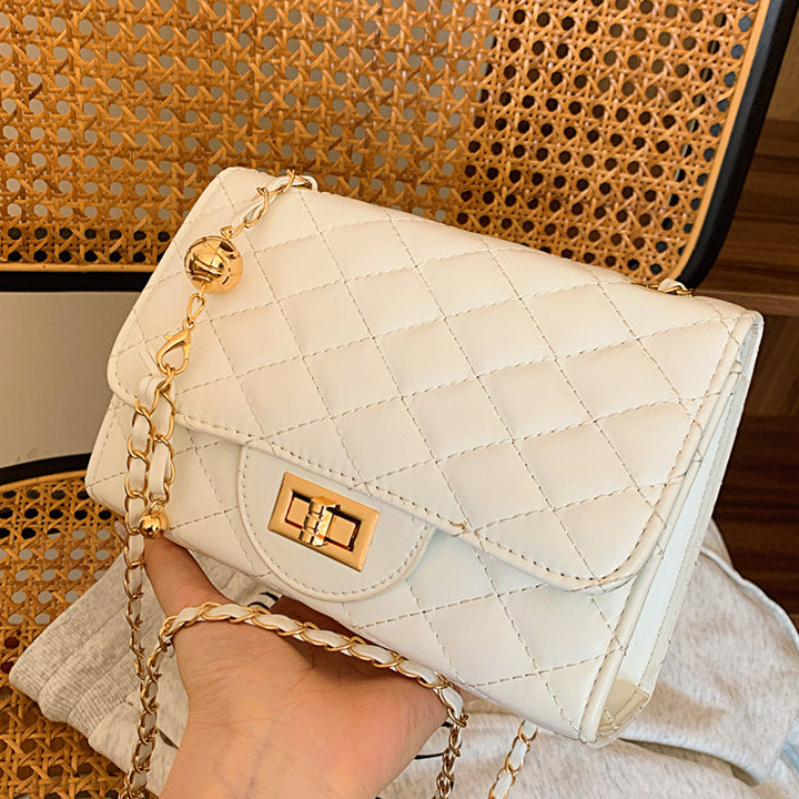 Damen Umhängetasche mit gefüttertem Quiltmuster und Goldakzenten Nord Taschen