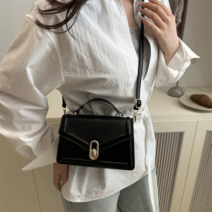Damen Elegante Handtasche mit goldenen Akzenten Nord Taschen