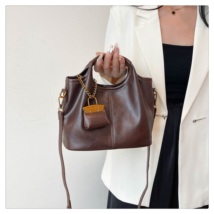 Damen elegante Handtasche mit abnehmbarem Charm Nord Taschen