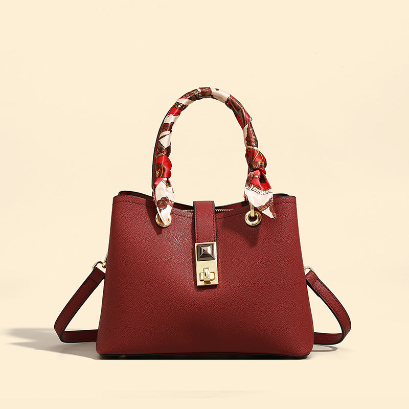 Damen Handtasche mit verspieltem Halstuch-Detail und elegantem Leder Nord Taschen