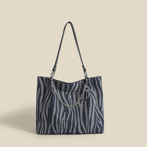 Damen Tote-Tasche mit stylischem Zebra-Muster und elegantem Kettenakzent Nord Taschen