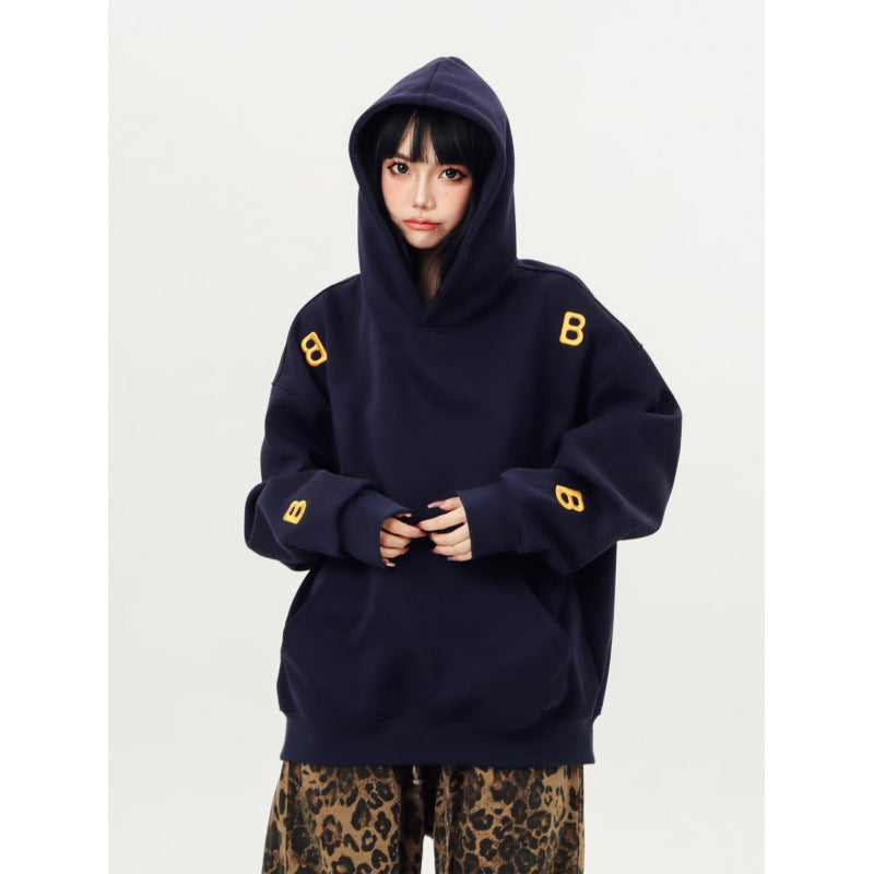 Unisex Oversized Kapuzenpullover mit großflächigem Intarsien‑Blockprint und geripptem Saum Nord Taschen