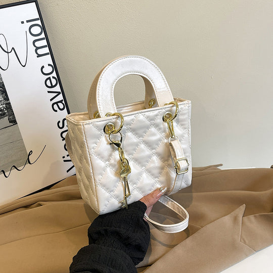 Damen elegante Mini-Henkeltasche mit gestepptem Design Nord Taschen