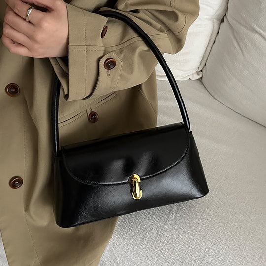 Damen elegante Handtasche mit geschwungenem Design und hochwertigem Kettenverschluss Nord Taschen