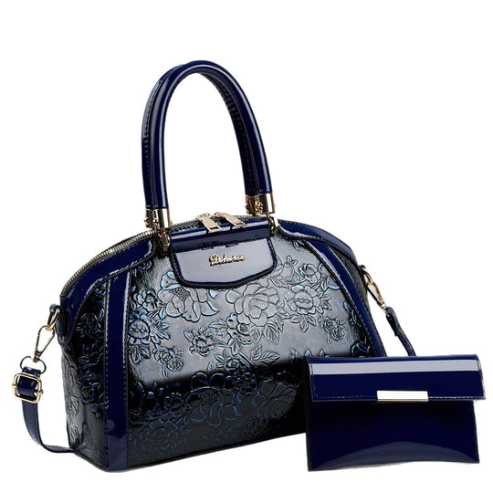 Damen modische Handtasche mit floralen Prägungen und Glanz-Akzenten Nord Taschen