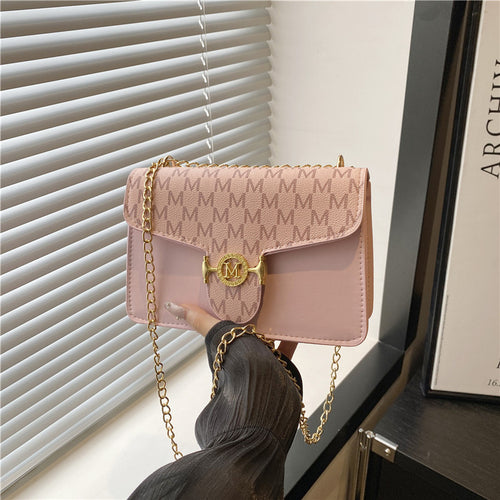 Damen Umhängetasche mit goldener Kettenverzierung und Designer-Logo Nord Taschen