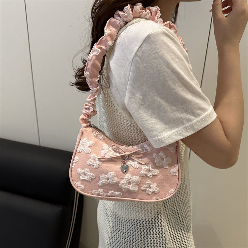Damen modische Umhängetasche mit floralem Design und raffiniertem Tragegriff Nord Taschen