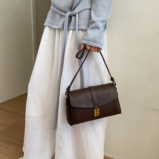 Damen Umhängetasche mit elegantem Klappverschluss und abnehmbarem Schulterriemen Nord Taschen
