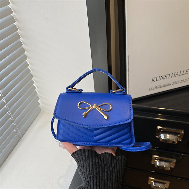 Damen Mini-Handtasche mit eleganter Schleifenverzierung Nord Taschen