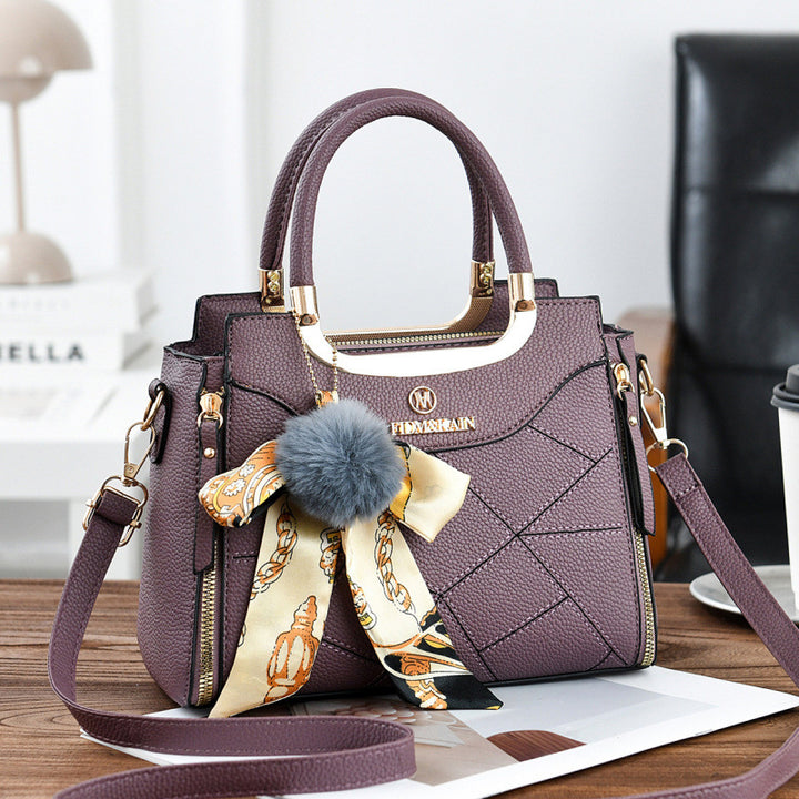Damen elegante Handtasche mit abnehmbarem Schleifen-Anhänger Nord Taschen