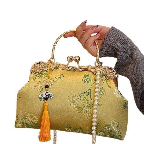 Damen elegante Umhängetasche mit floralem Design und goldenen Akzenten Nord Taschen