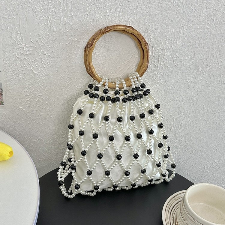 Damen Handtasche mit stilvollem Perlen-Design und nachhaltigem Bamboo-Griff Nord Taschen