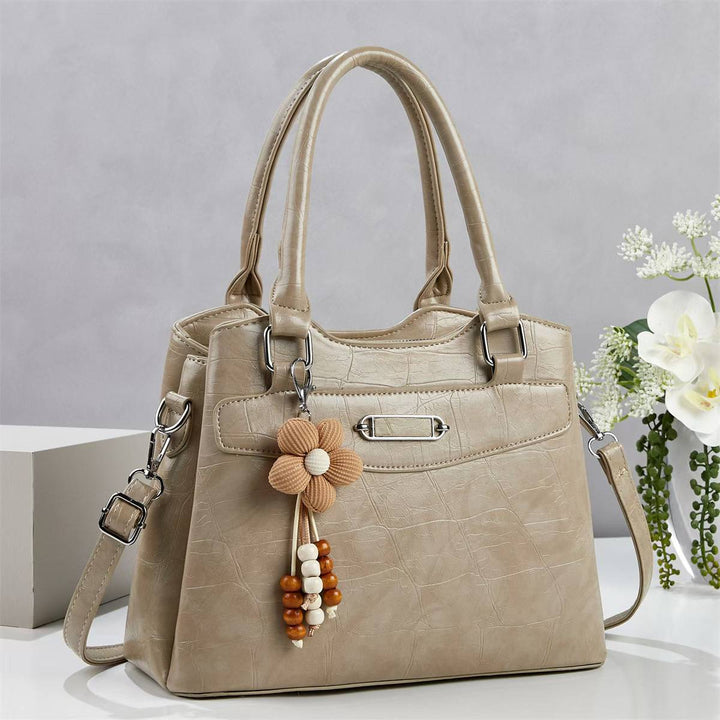 Damen Handtasche mit stilvollem Kroko-Design und abnehmbarem Blumenanhänger Nord Taschen
