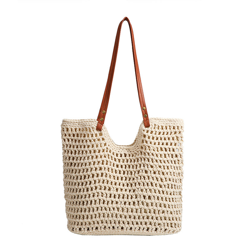 Damen Handtasche aus gewebtem Naturmaterial mit eleganten Lederakzenten Nord Taschen