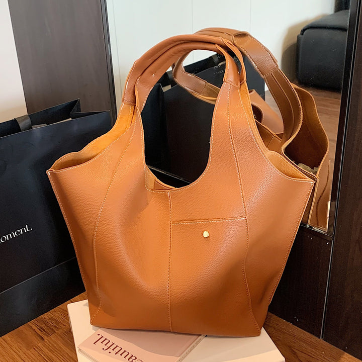 Damen stilvolle Handtasche mit zwei seitlichen Fächern Nord Taschen