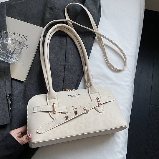 Damen Umhängetasche aus weichem Kunstleder mit kreativen Dekorelementen Nord Taschen