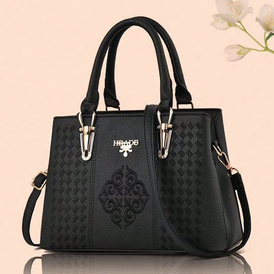 Damen elegante Handtasche mit aufwendigem gewebtem Design und kontrastierender Verzierung Nord Taschen