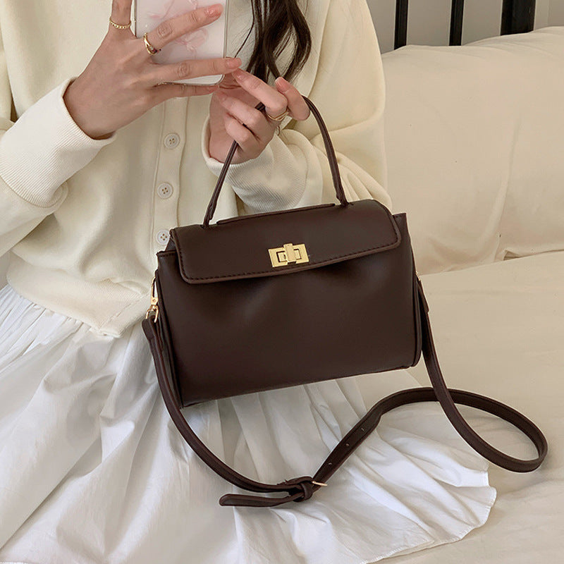 Damen elegante Handtasche mit strukturierter Oberfläche und goldfarbenem Schnallenverschluss Nord Taschen