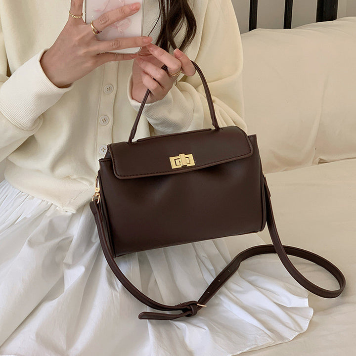 Damen elegante Handtasche mit strukturierter Oberfläche und goldfarbenem Schnallenverschluss Nord Taschen