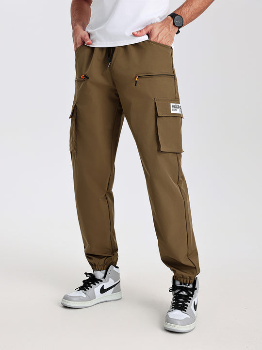 Herren konisch geschnittene Utility-Cargohose im Joggerstil mit Tunnelzugbund, Reißverschlusstaschen & elastischen Beinabschlüssen Nord Taschen