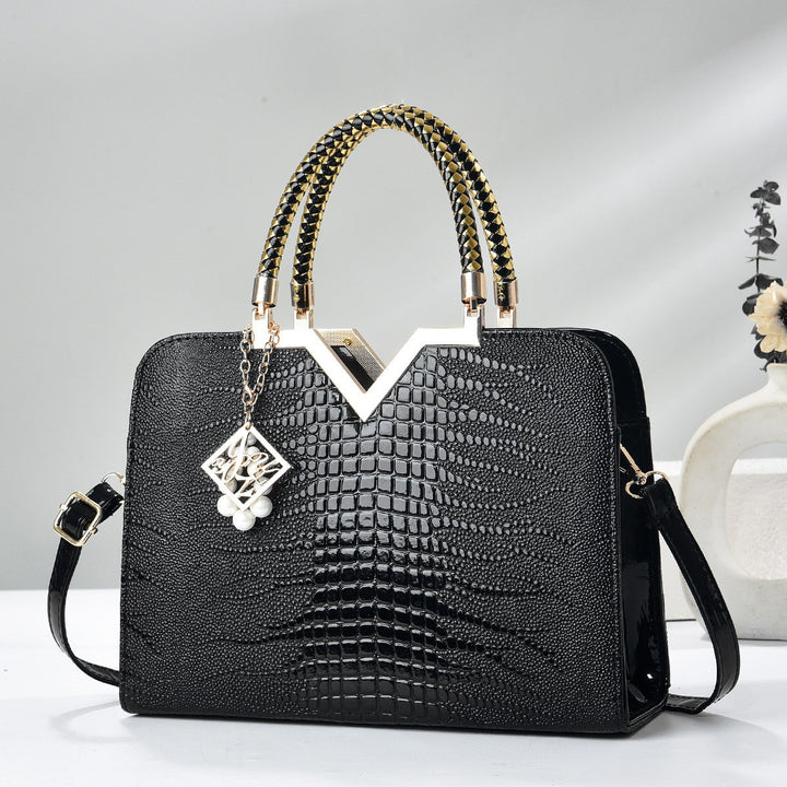 Damen elegante Handtasche mit luxuriöser Croco-Prägung und goldenen Akzenten Nord Taschen