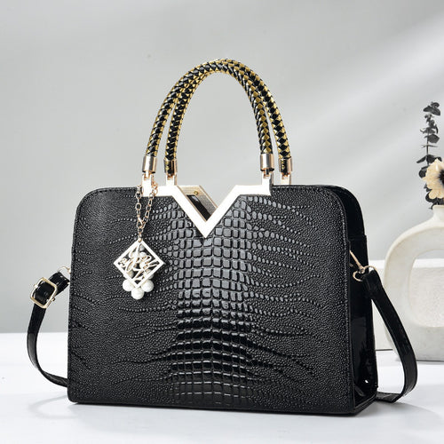 Damen elegante Handtasche mit luxuriöser Croco-Prägung und goldenen Akzenten Nord Taschen