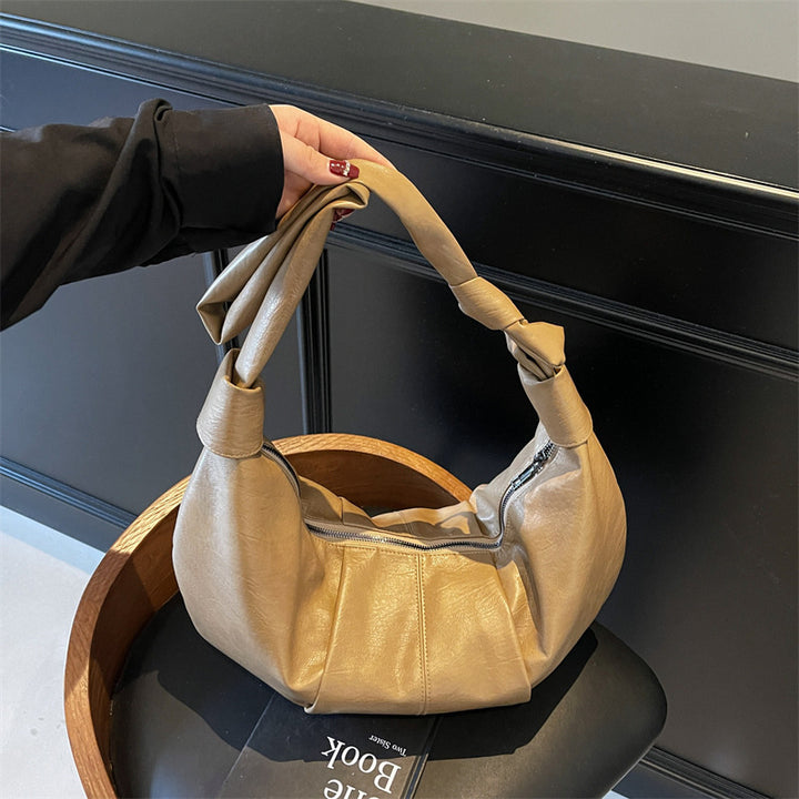 Damen Hobo-Tasche aus hochwertigem Kunstleder mit gefaltetem Design und einem modischen Trageriemen Nord Taschen