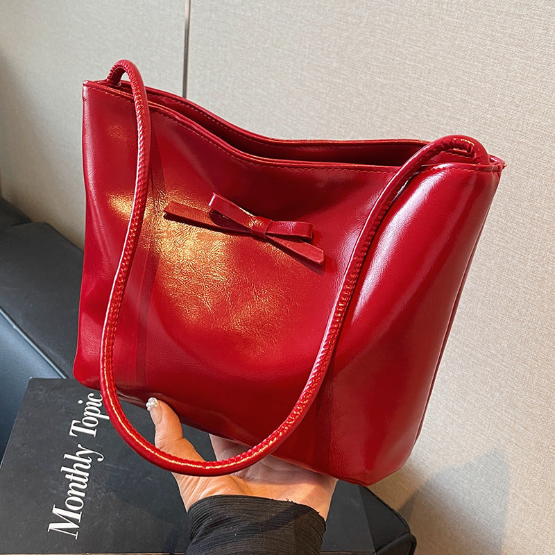 Damen Henkeltasche mit elegantem Schleifendetail und hochwertiger Lederoberfläche Nord Taschen