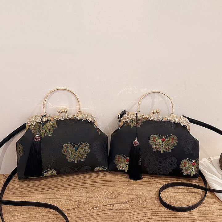 Damen modische Handtasche mit filigranem Schmetterlingsmuster und eleganten Akzenten Nord Taschen
