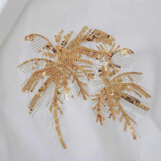 Damen Oversize-Hemdbluse mit Palm-Motiv aus goldenen Pailletten Nord Taschen