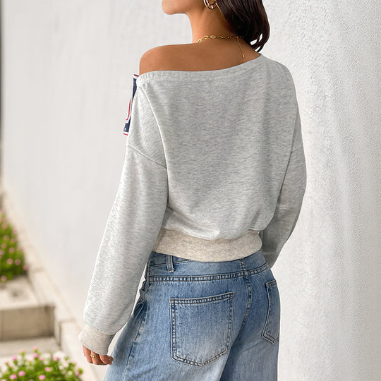 Damen Lässig geschnittenes Off-Shoulder Cropped-Sweatshirt im Vintage-College-Look Nord Taschen