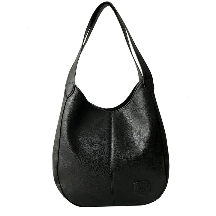 Damen Handtasche mit geschwungenem Design und hochwertiger Lederstruktur Nord Taschen