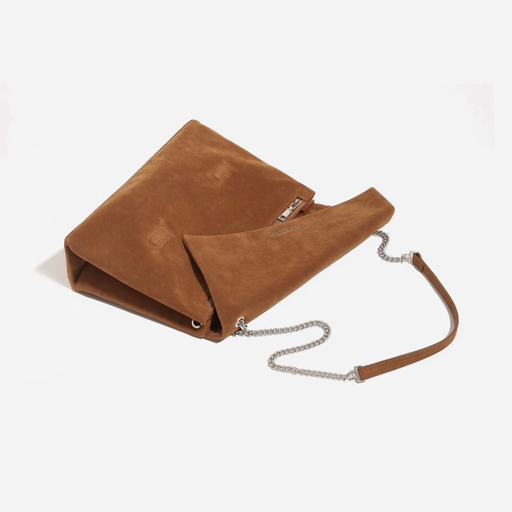 Damen Clutch-Tasche aus glänzendem Kunstleder mit dekorativem Kettenriemen Nord Taschen