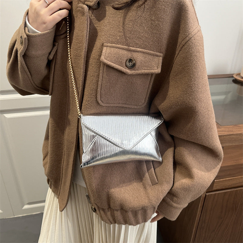 Damen elegante Clutch mit schimmerndem Wellenmuster Nord Taschen