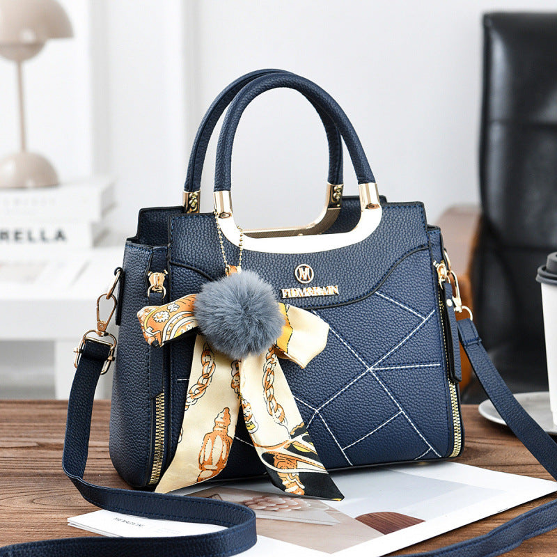 Damen elegante Handtasche mit abnehmbarem Schleifen-Anhänger Nord Taschen
