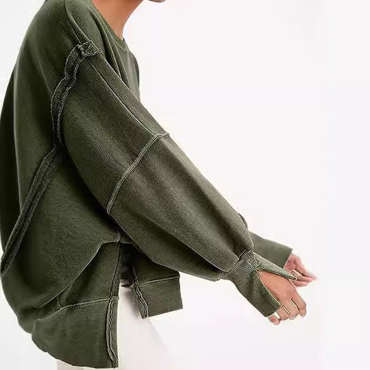 Damen Oversized Sweatshirt mit Ballonärmeln, seitlichen Schlitzen und offenen Kanten Nord Taschen