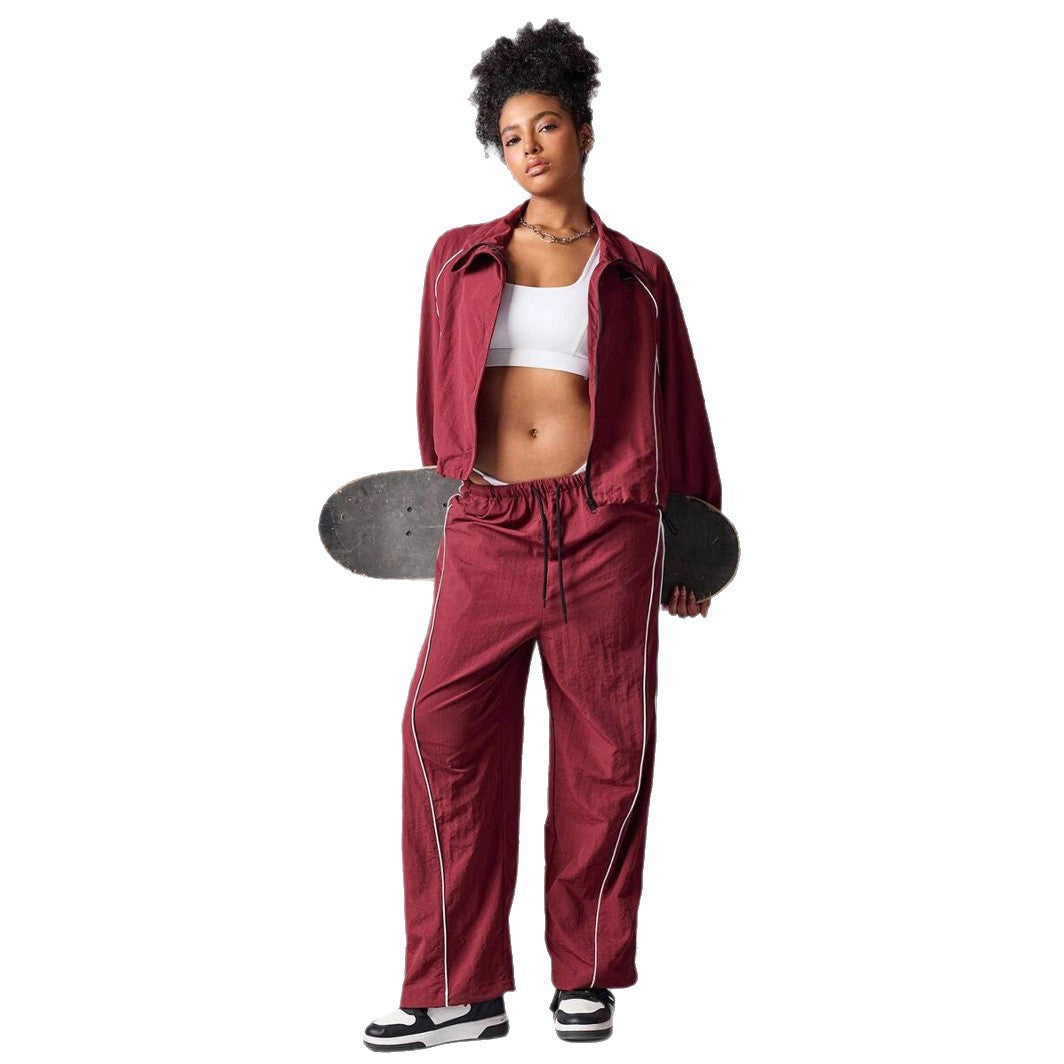 Damen sportives Cropped Windbreaker-Set mit Stehkragen Tunnelzug und reflektierenden Paspeln Nord Taschen