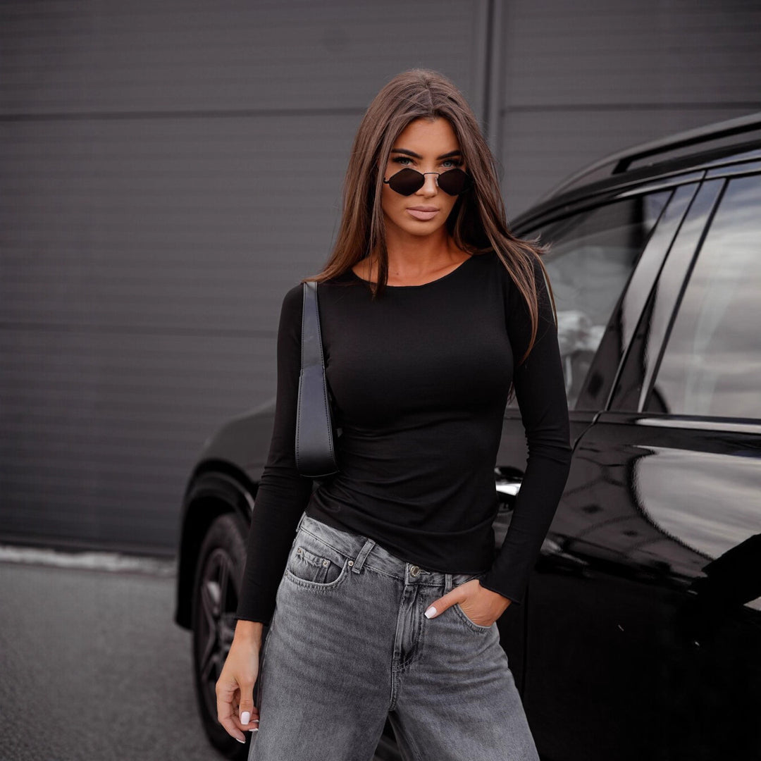 Damen figurbetontes Langarm-Shirt und weite High-Waist Denim-Jeans Nord Taschen