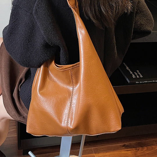 Damen Hobo-Tasche aus weichem Kunstleder mit praktischem Innenteil Nord Taschen