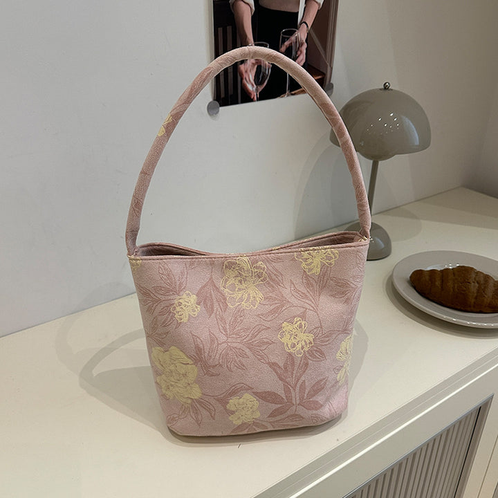 Damen Handtasche mit floralem Design und sanften Akzenten Nord Taschen