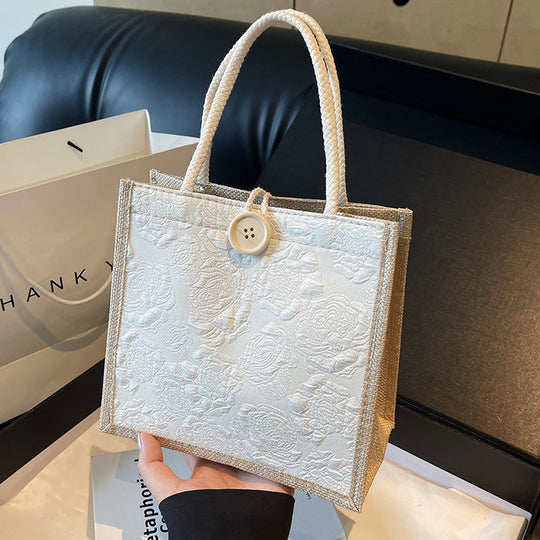 Damen Jute-Umhängetasche mit floralem Design und praktischem Buttonverschluss Nord Taschen