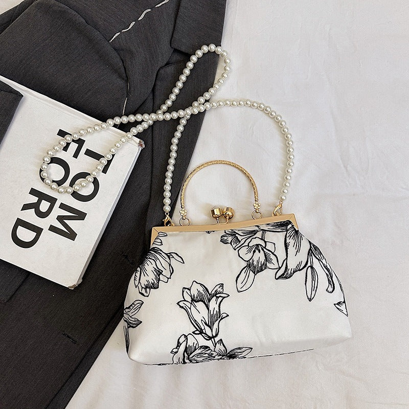 Damen Clutch-Tasche mit perlverziertem Blumenmuster und elegantem Metallverschluss Nord Taschen
