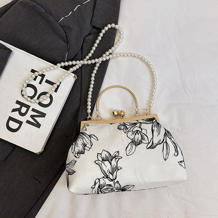 Damen Clutch-Tasche mit perlverziertem Blumenmuster und elegantem Metallverschluss Nord Taschen