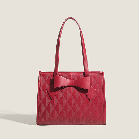 Damen Handtasche mit eleganter Diamantsteppung und dekorativem Schleifenakzent Nord Taschen