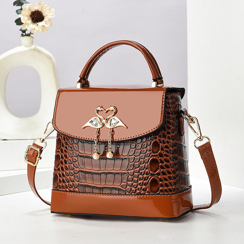 Damen elegante Handtasche im stilvollen Krokodil-Look mit einzigartigem Verschluss Nord Taschen